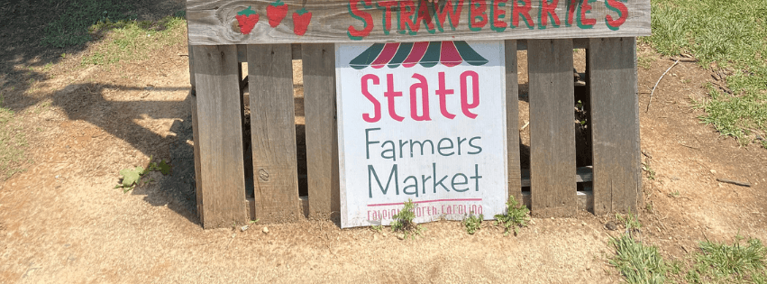 Vendors and shoppers at a North Carolina farmers market